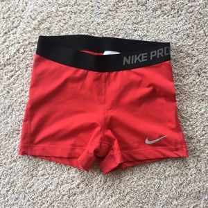 red nike spandex shorts
